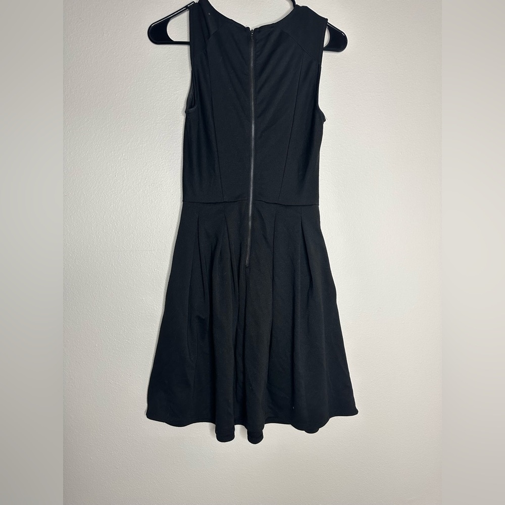 Black knee length dress with pockets